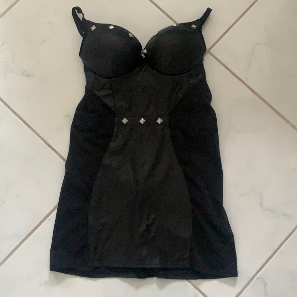 Super cute black leather mini dress in size medium never worn . Sexy & classy